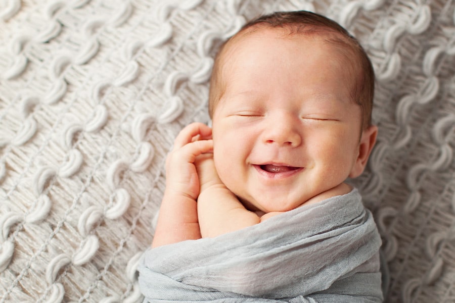 Smiling, Sleeping Newborn - Miette Photography