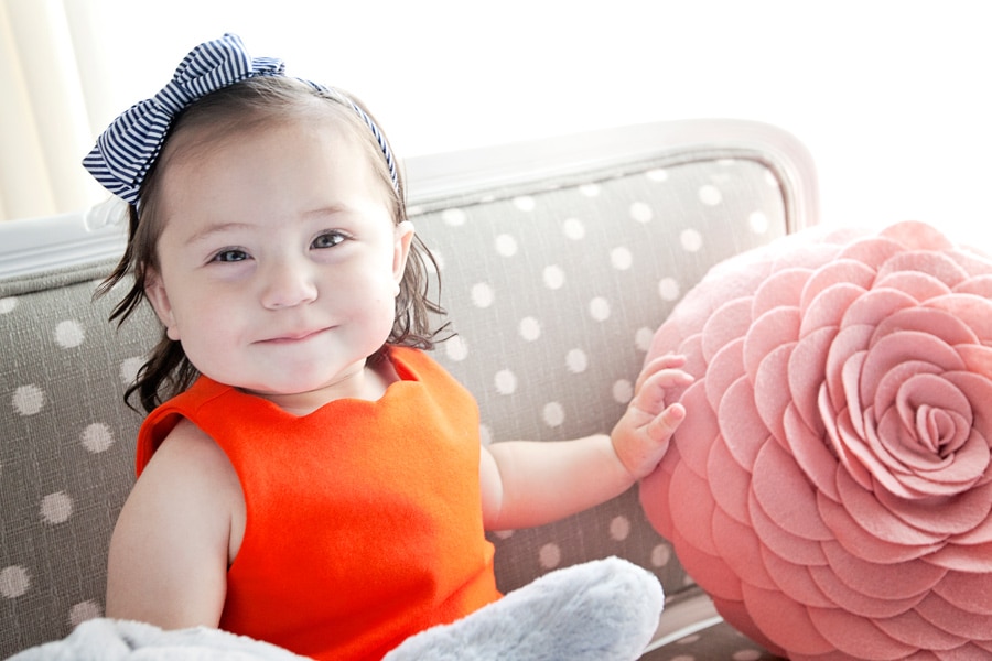 beautiful 1 year old girl in private studio