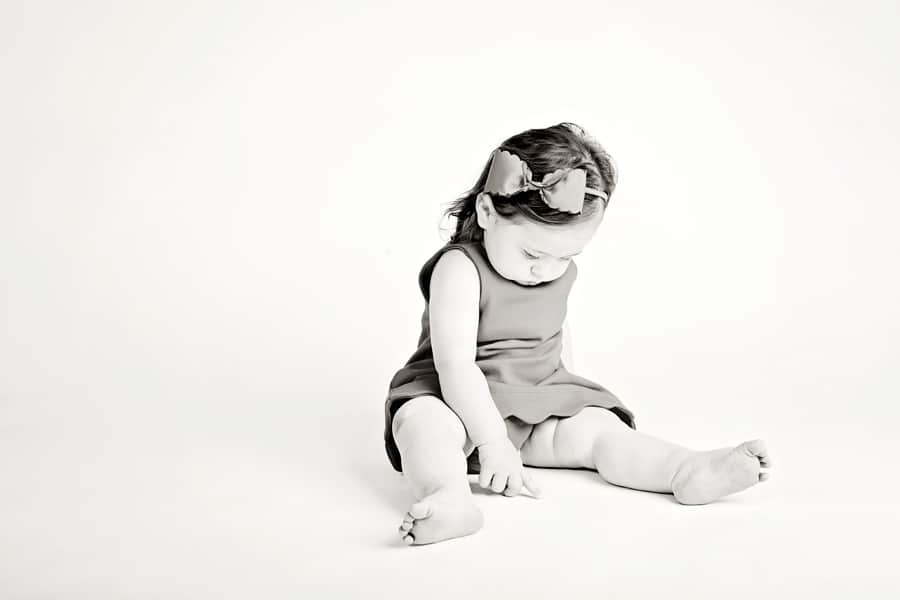 beautiful 1 year old girl in private studio