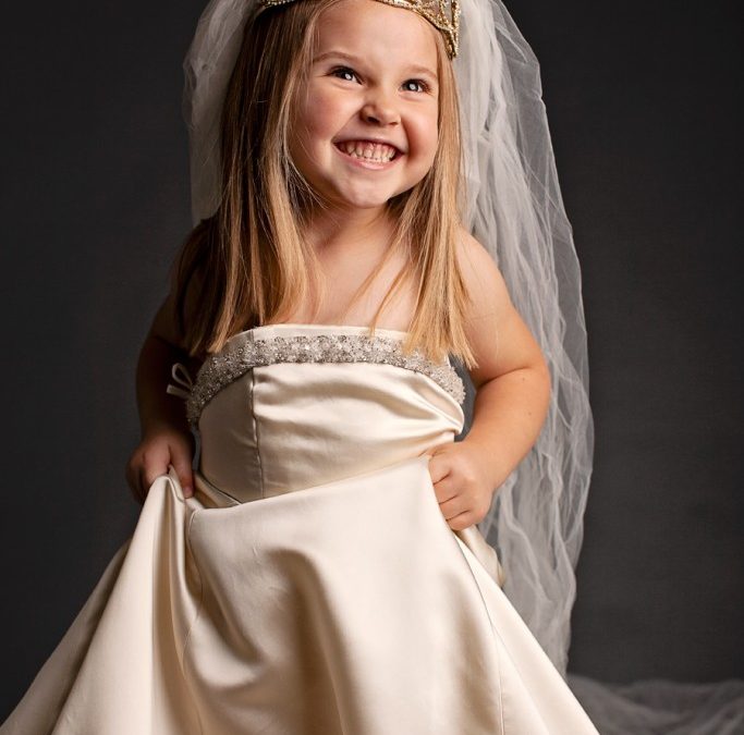 Dress-Up Photos for Little Girl in Her Mother’s Wedding Dress