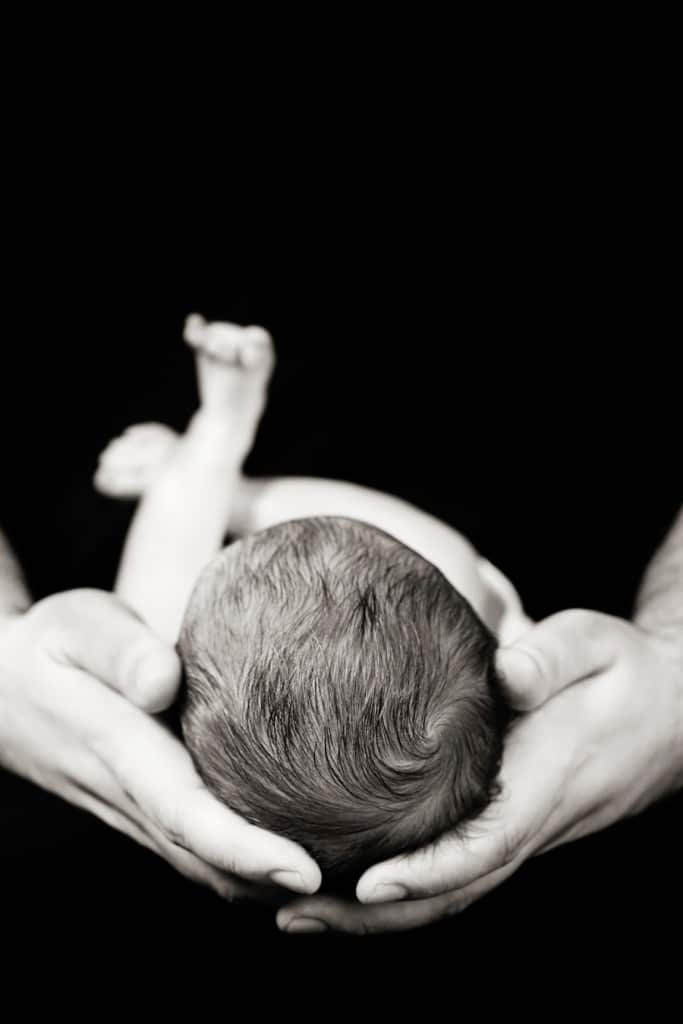 Adorable generational maternity and newborn session in private studio