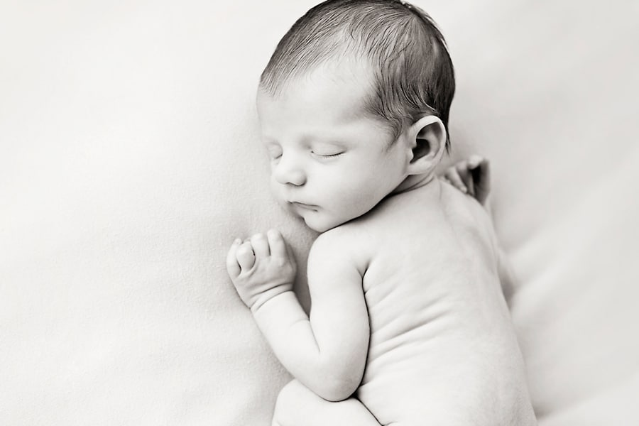 Adorable generational maternity and newborn session in private studio