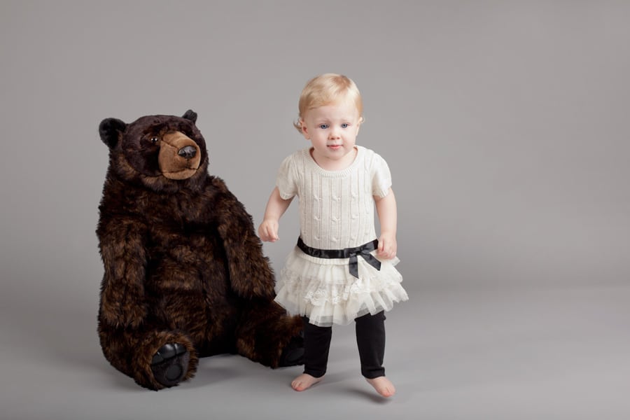 Russian doll and little girl posing in adorable studio session