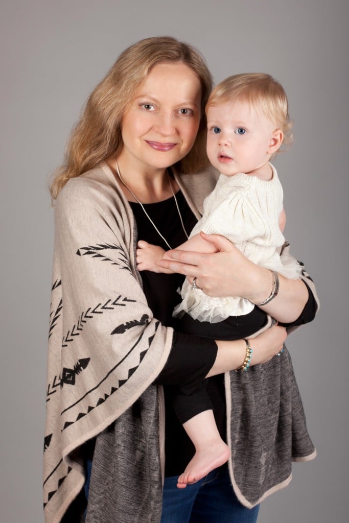 Russian doll and little girl posing in adorable studio session