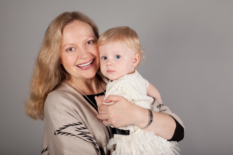 Russian doll and little girl posing in adorable studio session