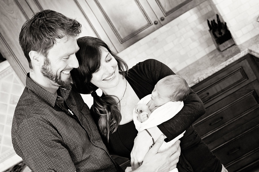 in-home newborn session with the cutest baby posing