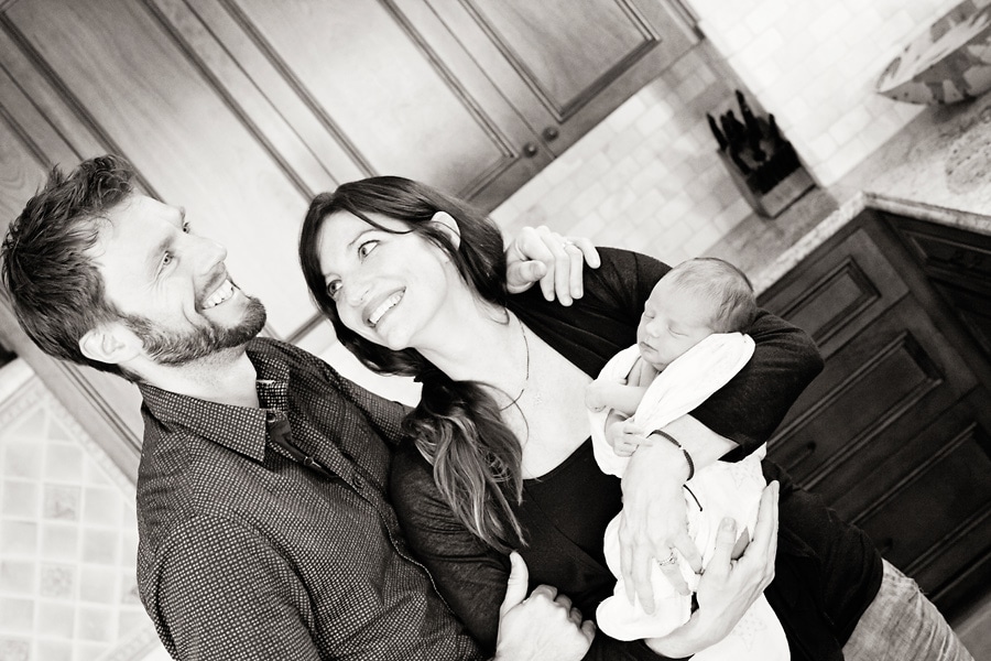 in-home newborn session with the cutest baby posing