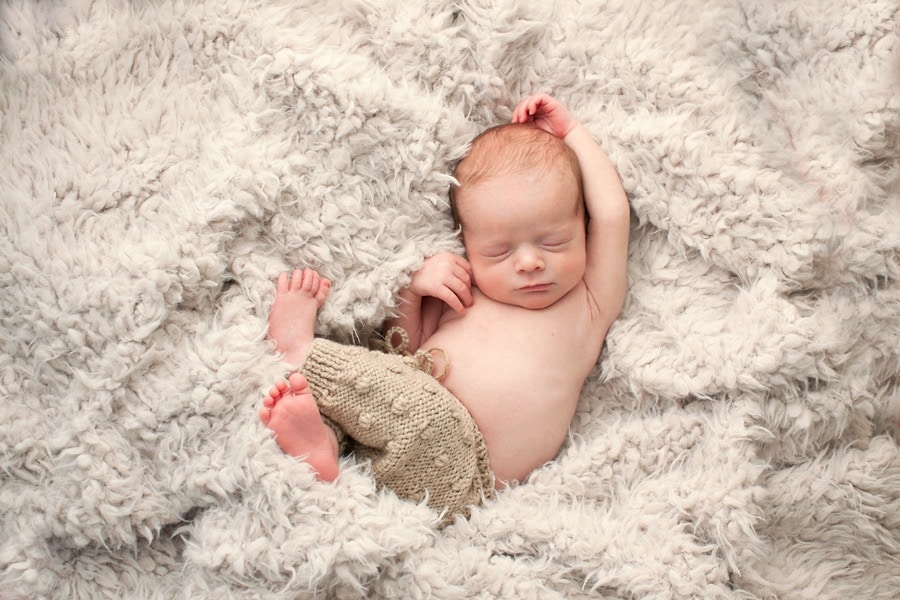 Capturing Smiles In a Newborn Photo Shoot