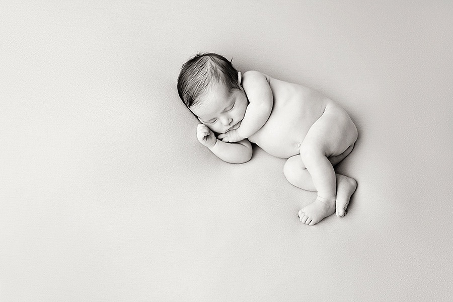 newborn baby girl in luxury Dallas Studio