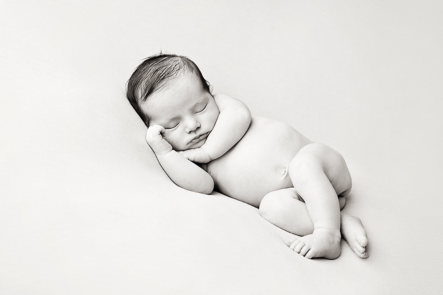 newborn baby girl in luxury Dallas Studio