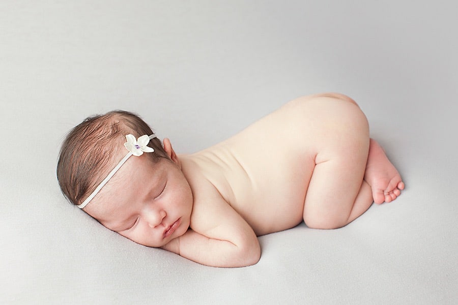 newborn baby girl in luxury Dallas Studio