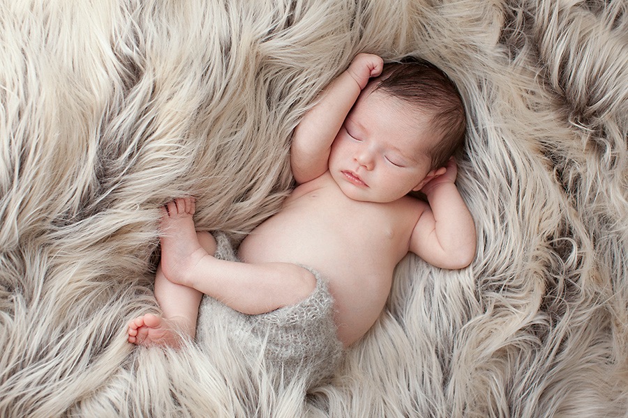 newborn baby girl in luxury Dallas Studio