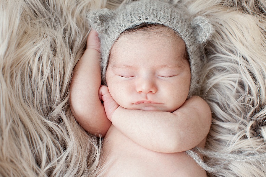 newborn baby girl in luxury Dallas Studio