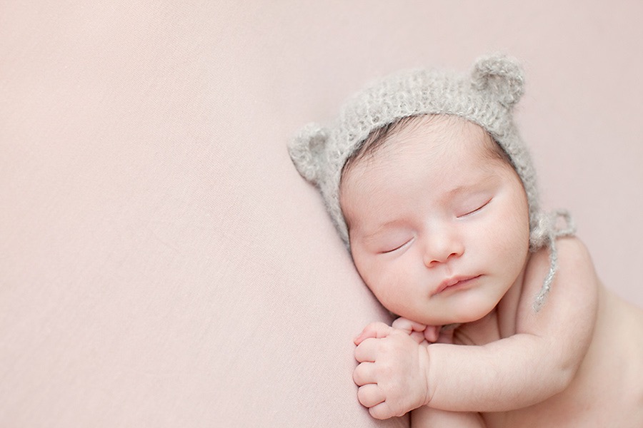 newborn baby girl in luxury Dallas Studio