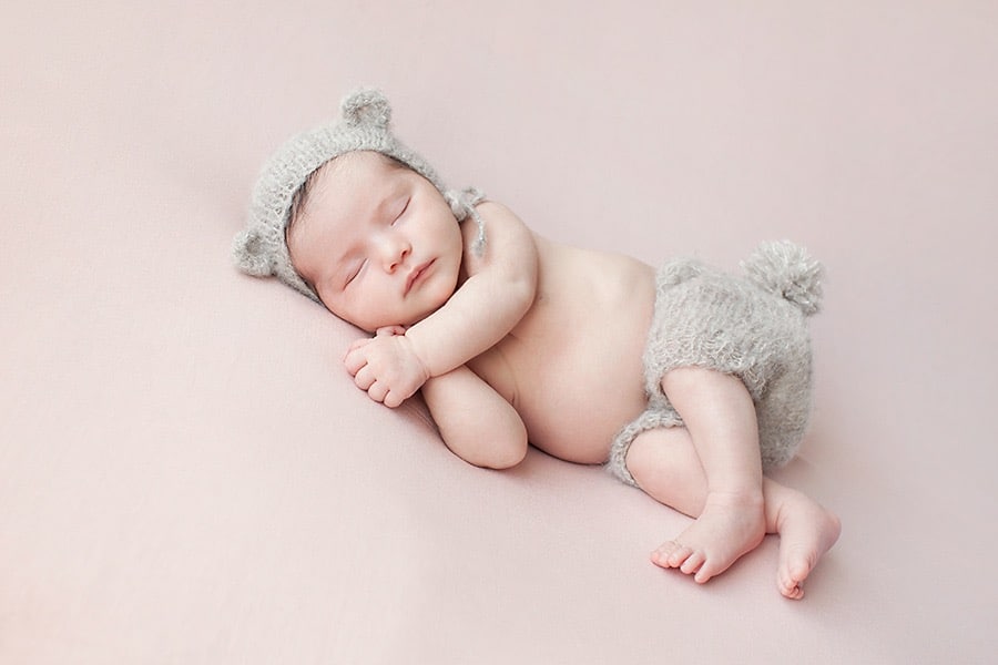 newborn baby girl in luxury Dallas Studio
