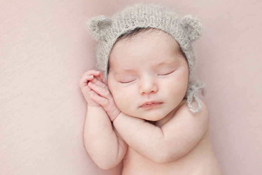 newborn baby girl in luxury Dallas Studio