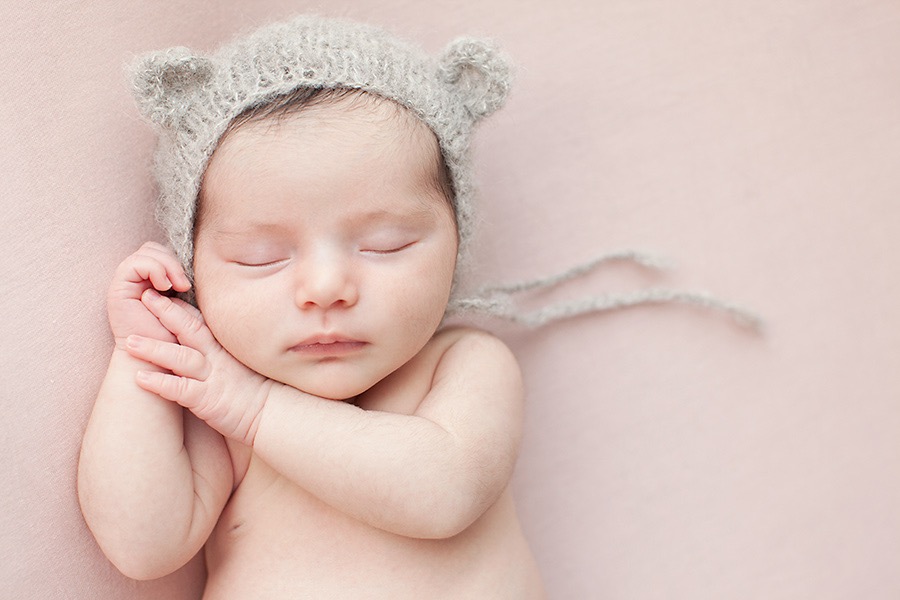 newborn baby girl in luxury Dallas Studio
