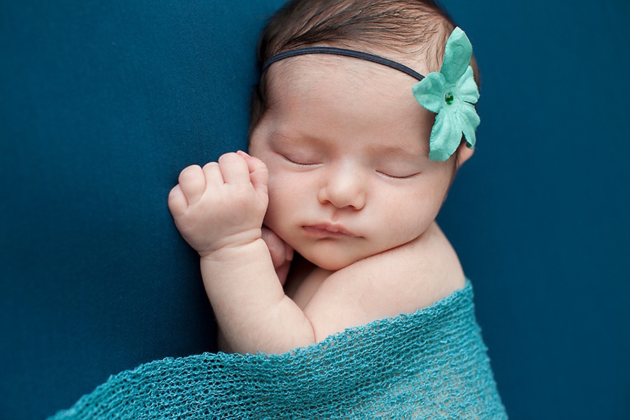 newborn baby girl in luxury Dallas Studio