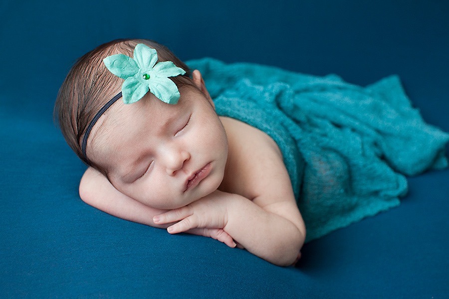 newborn baby girl in luxury Dallas Studio