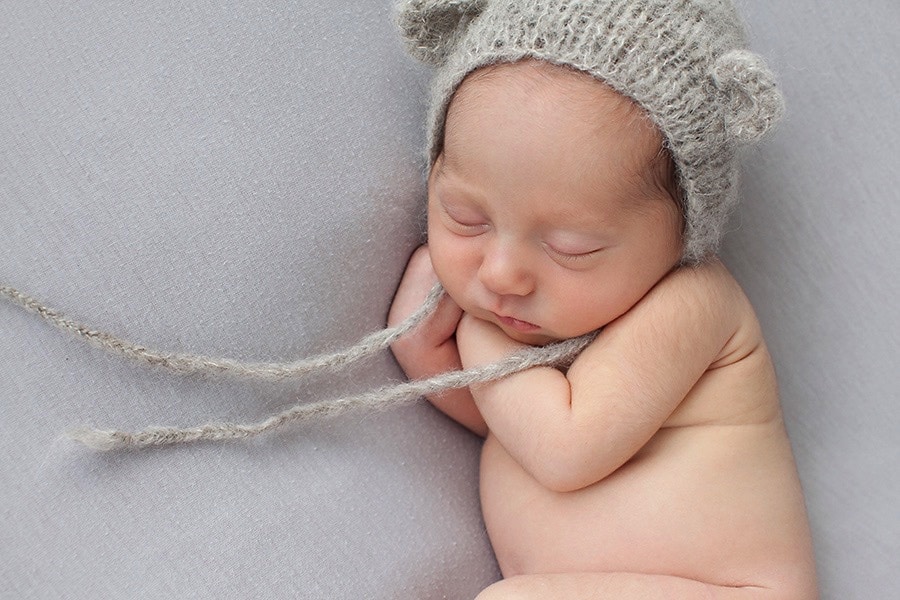 the cutest baby girl snoozing in private Dallas Studio
