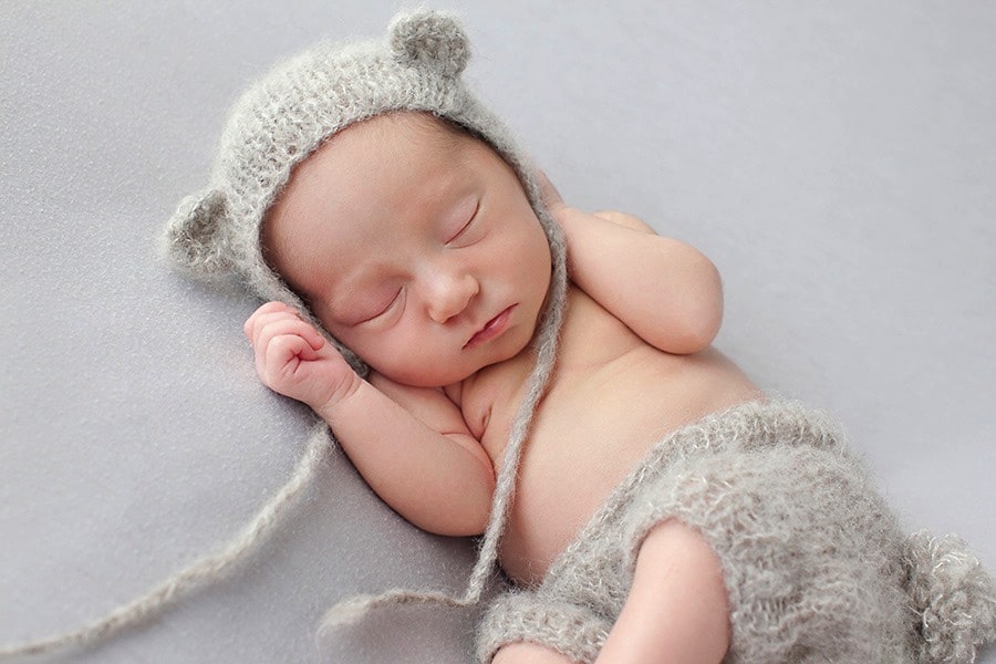 the cutest baby girl snoozing in private Dallas Studio