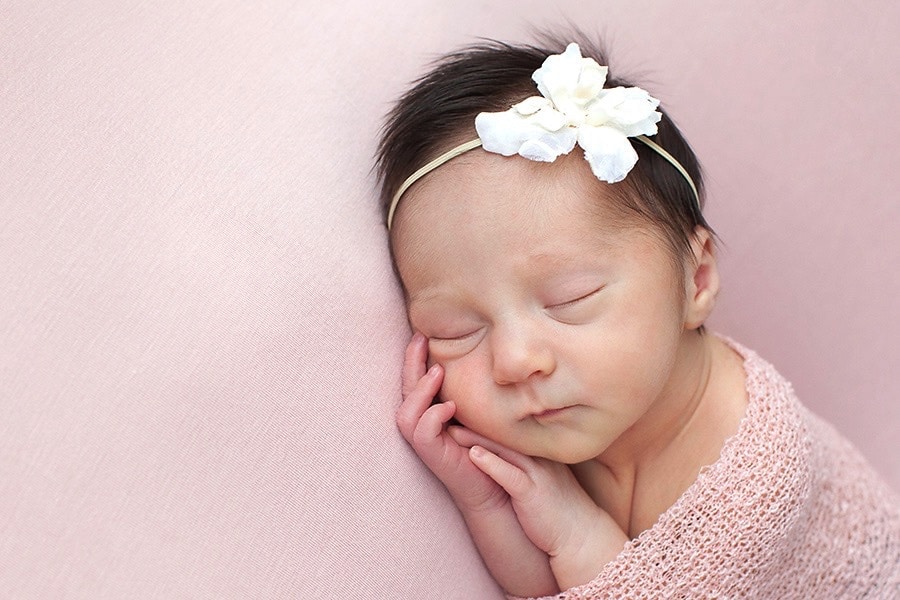the cutest baby girl snoozing in private Dallas Studio