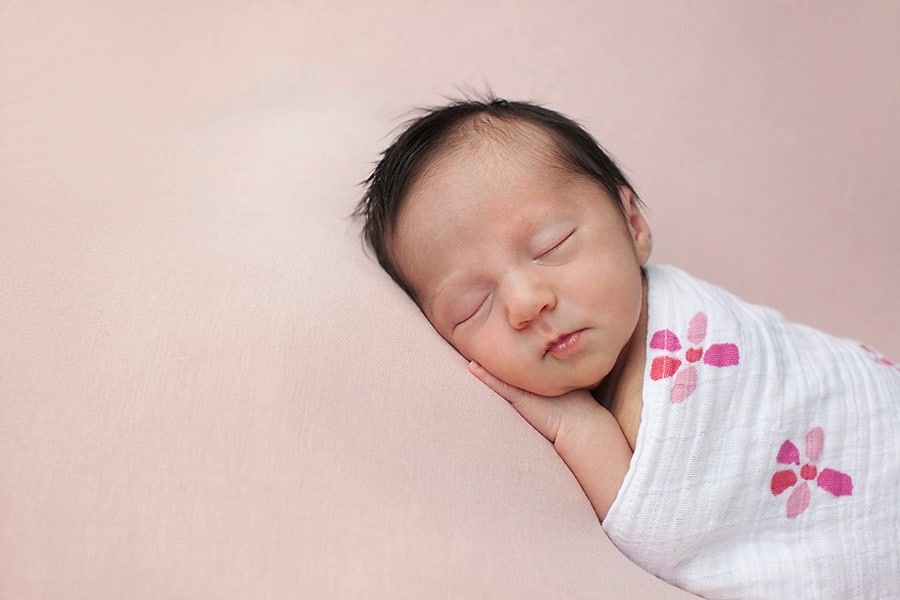 the cutest baby girl snoozing in private Dallas Studio