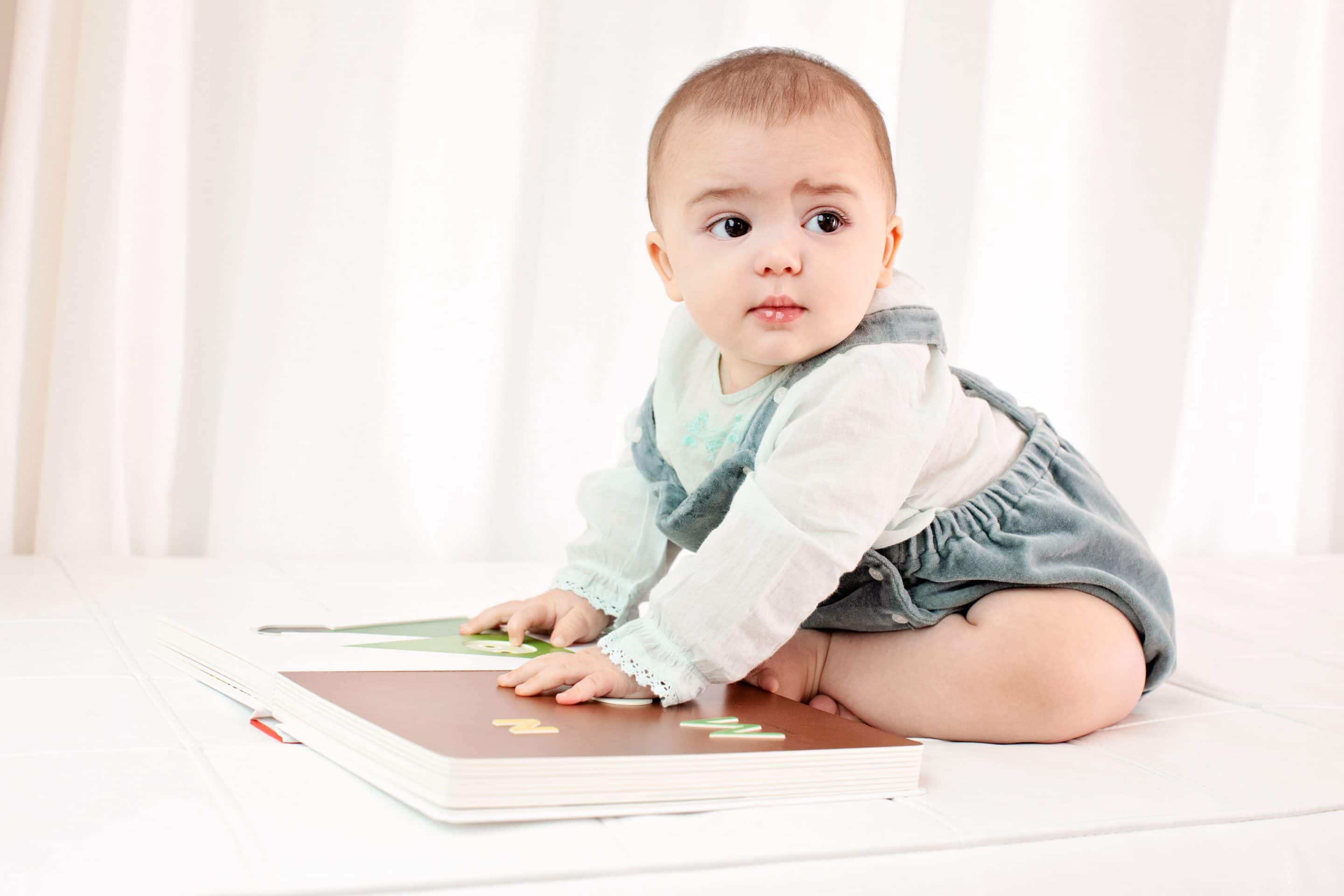 the cutest six month baby running around private studio