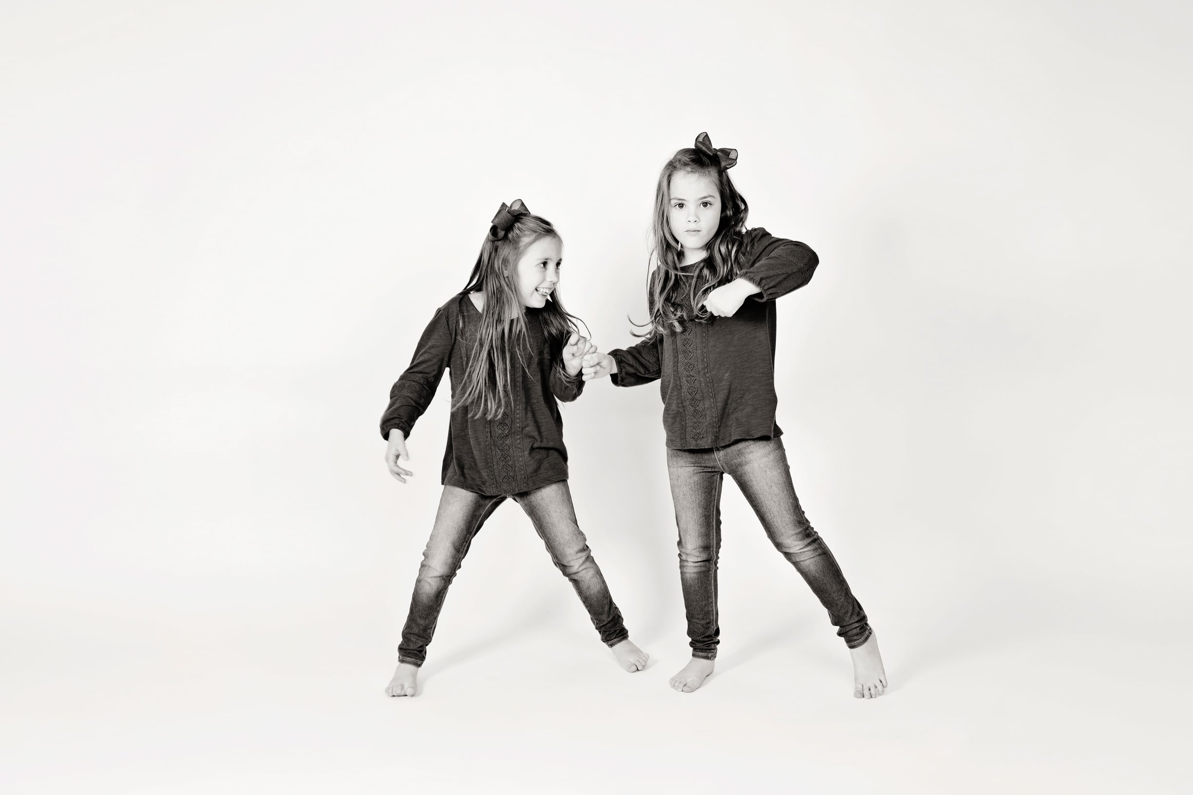 adorable sister posing in private Dallas Studio