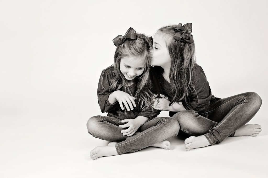 adorable sister posing in private Dallas Studio