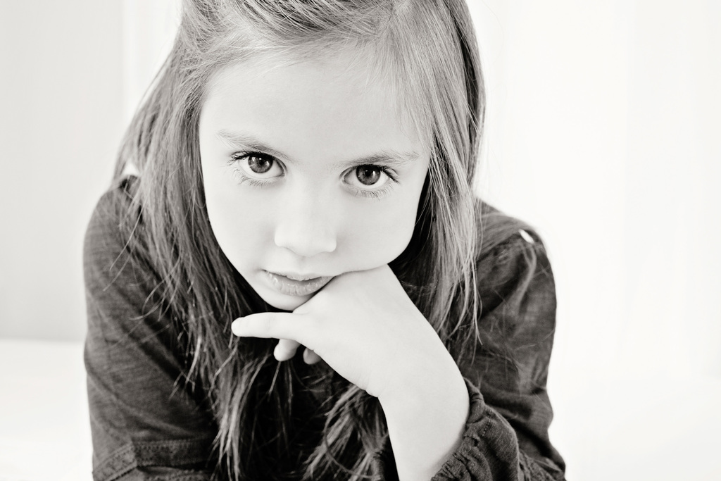 adorable sisters posing in private Dallas Studio
