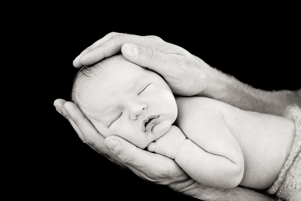 beautiful newborn posing in Dallas Studio 