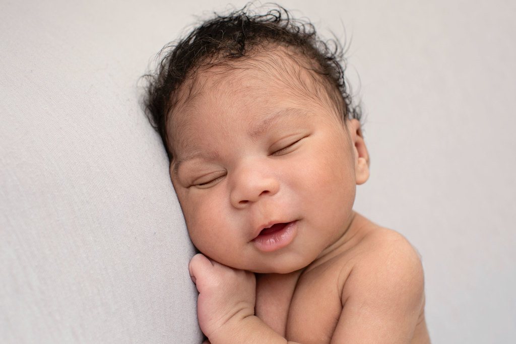 beautiful baby cozied up in studio session