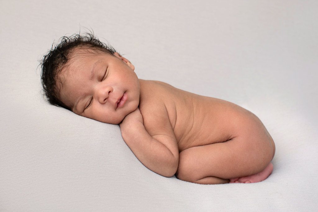 beautiful baby cozied up in studio session