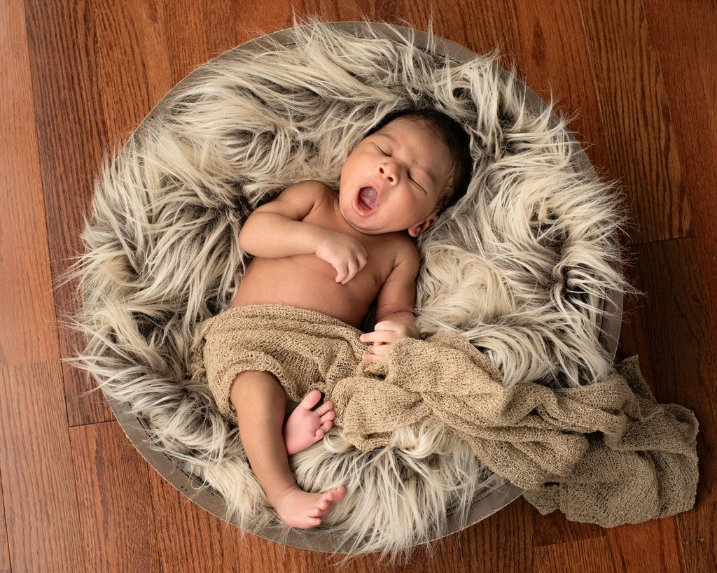 beautiful baby cozied up in studio session