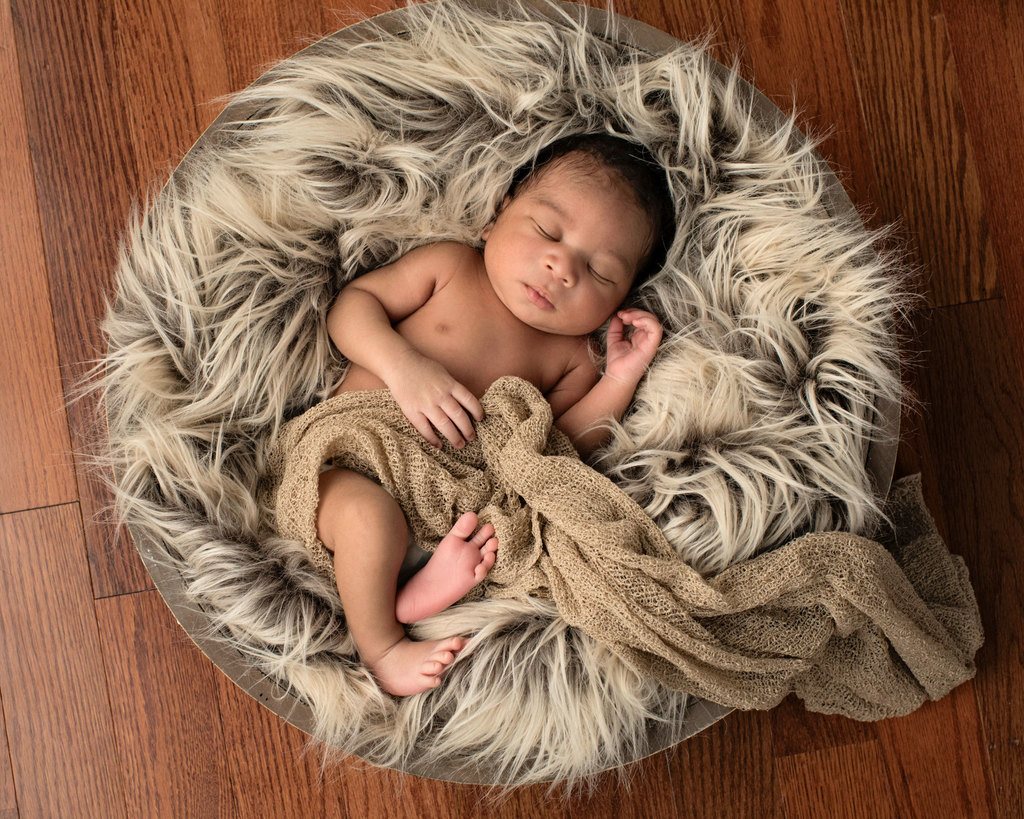 beautiful baby cozied up in studio session