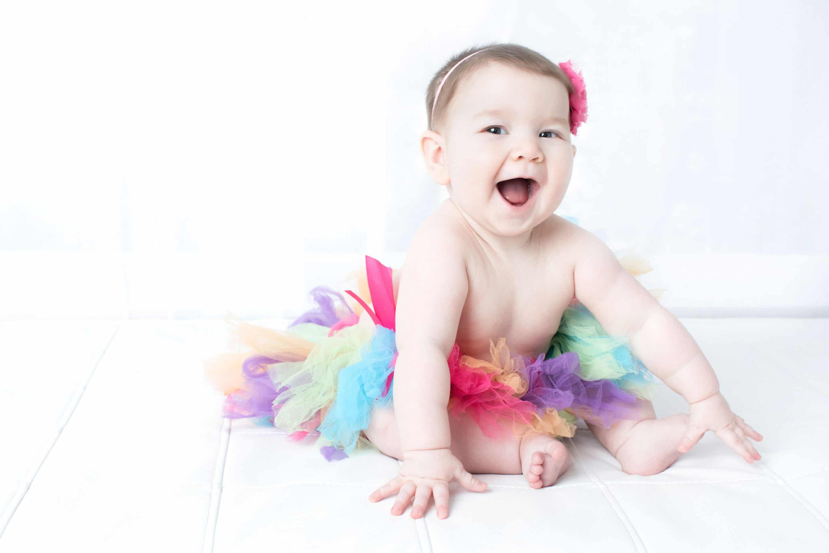 beautiful six-month little girl posing in private studio session