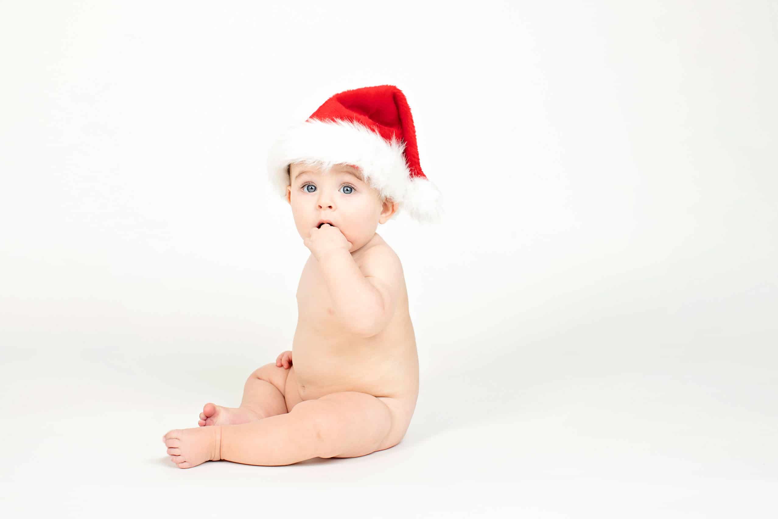 six-month session in private studio with Santa hat
