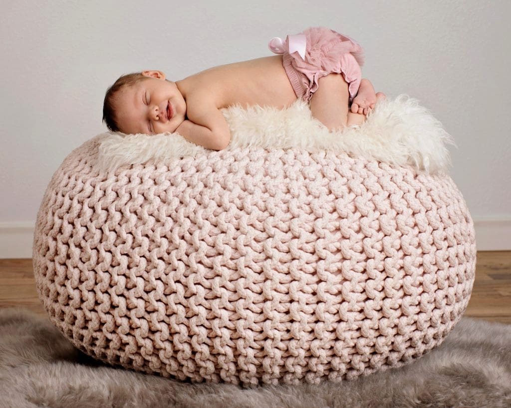 stunning baby girl decked out in pink at private studio newborn session