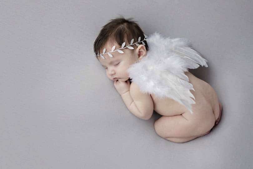 gorgeous baby in angel wings and halo in dallas studio