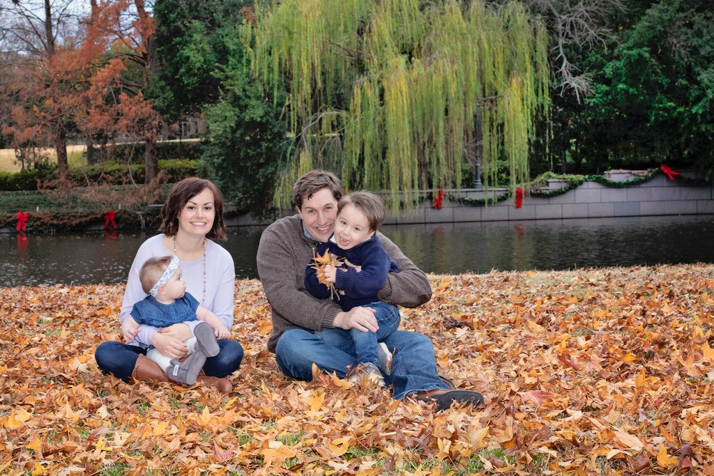 beautiful family of four poses outside for memorable photos