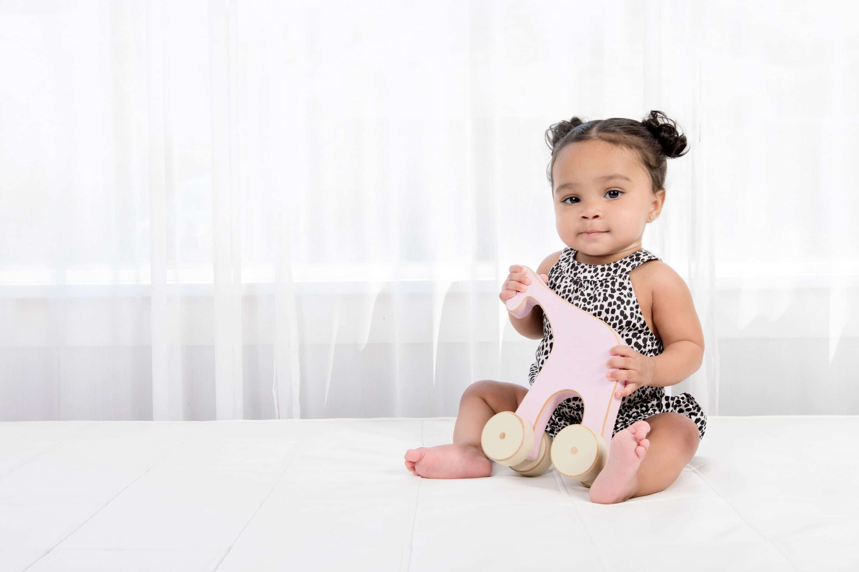 beautiful six-month session with little girl in private dallas studio