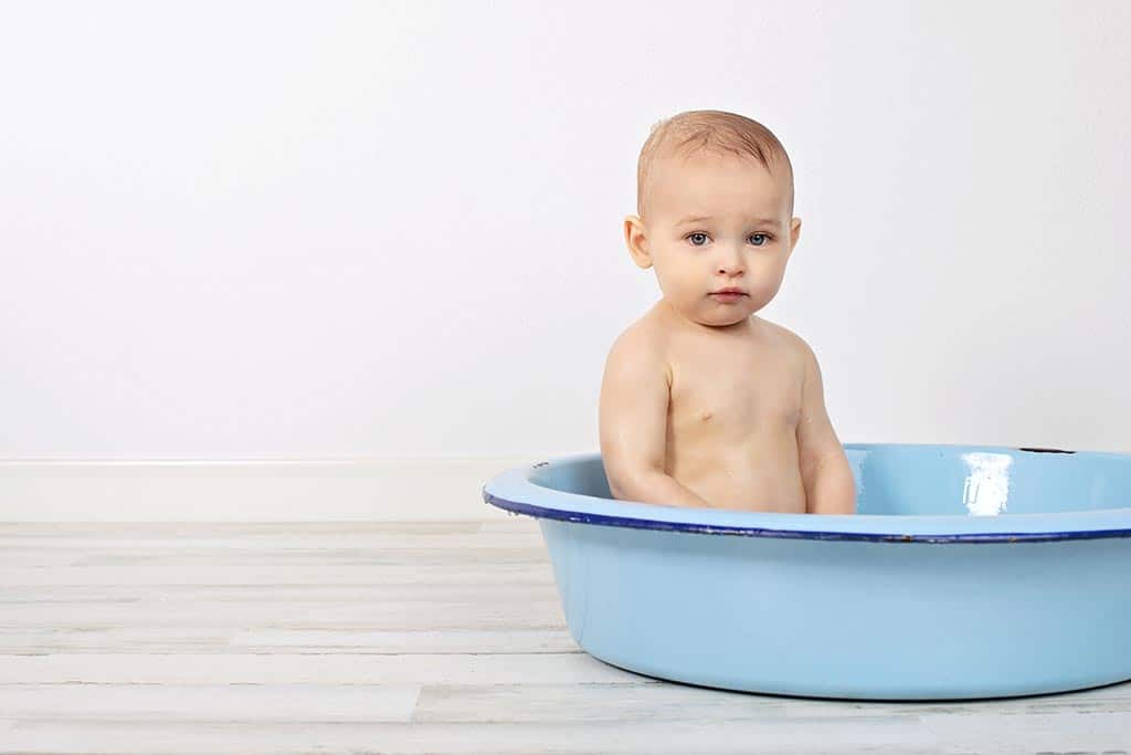 beautiful family session in private studio celebrating toddler's first birthday