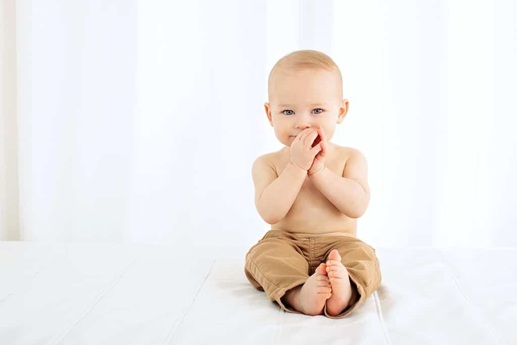 beautiful family session in private studio celebrating toddler's first birthday