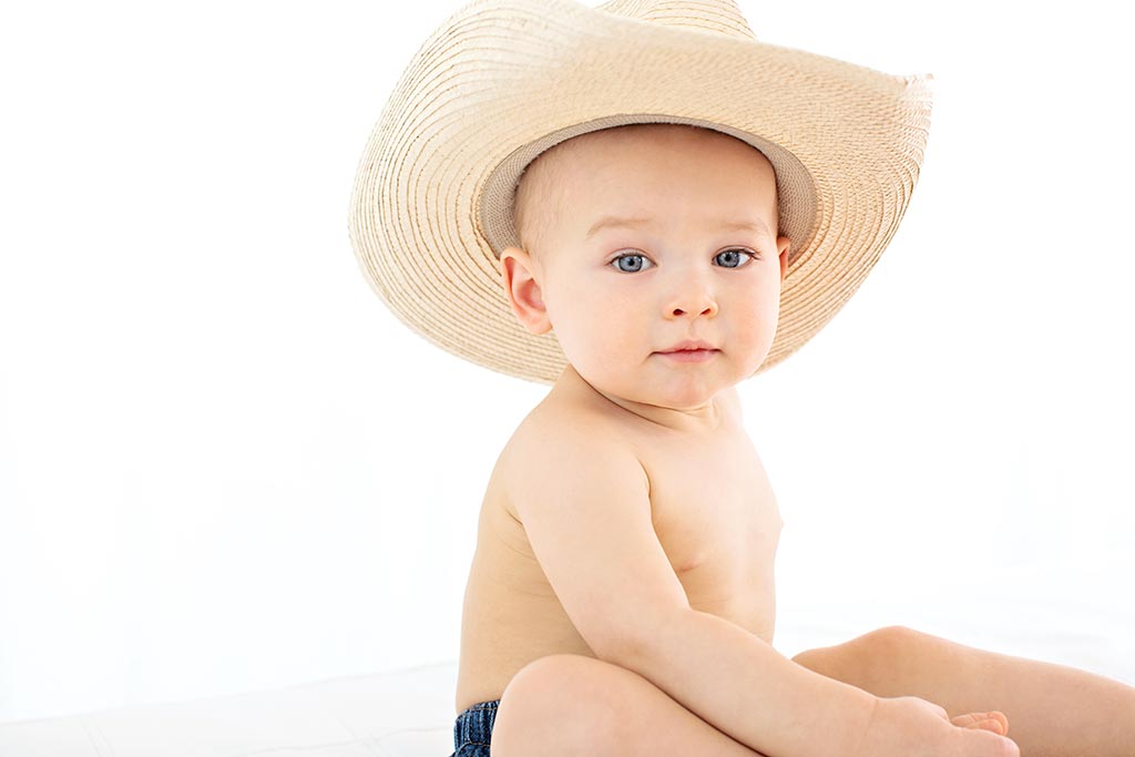 beautiful family session in private studio celebrating toddler's first birthday