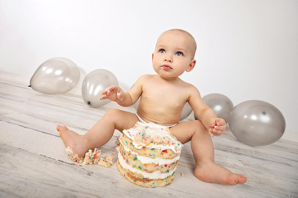 beautiful family session in private studio celebrating toddler's first birthday