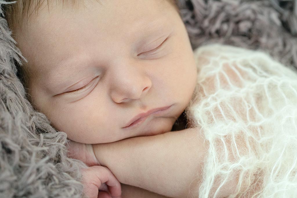 the warmest and coziest newborn session in private dallas studio