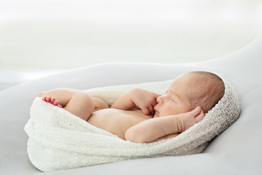 sleepy newborn session in private dallas studio