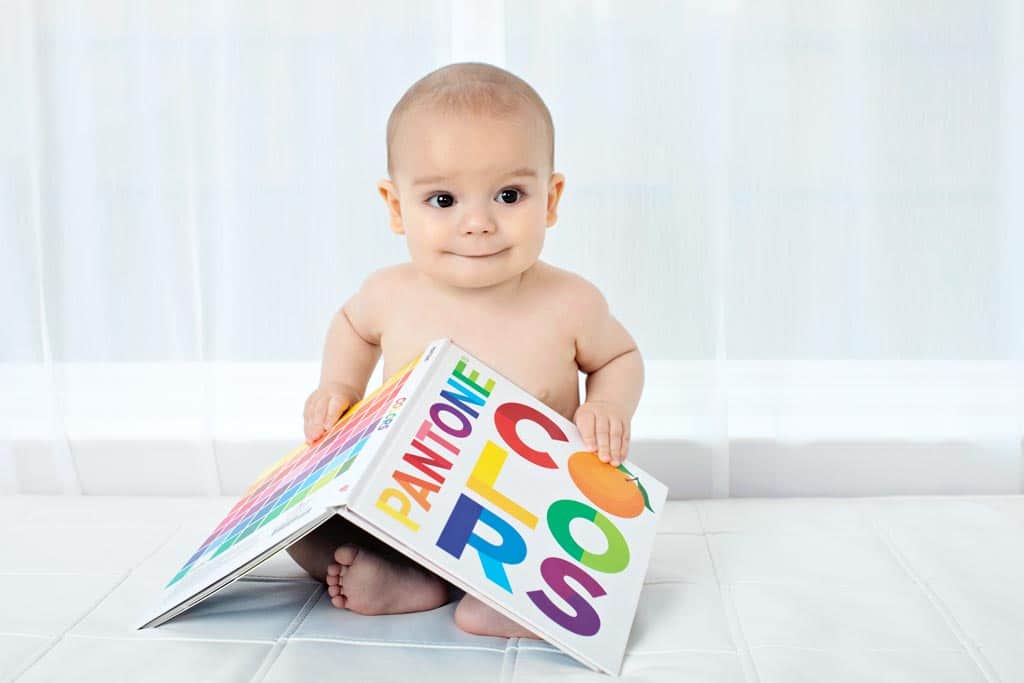 six-month baby is all smiles in private studio session