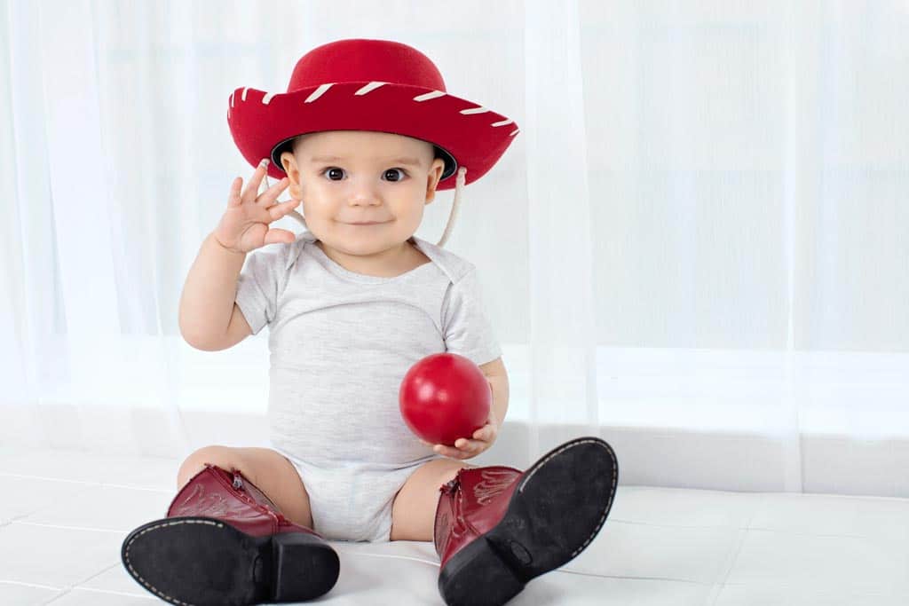 six-month baby is all smiles in private studio session